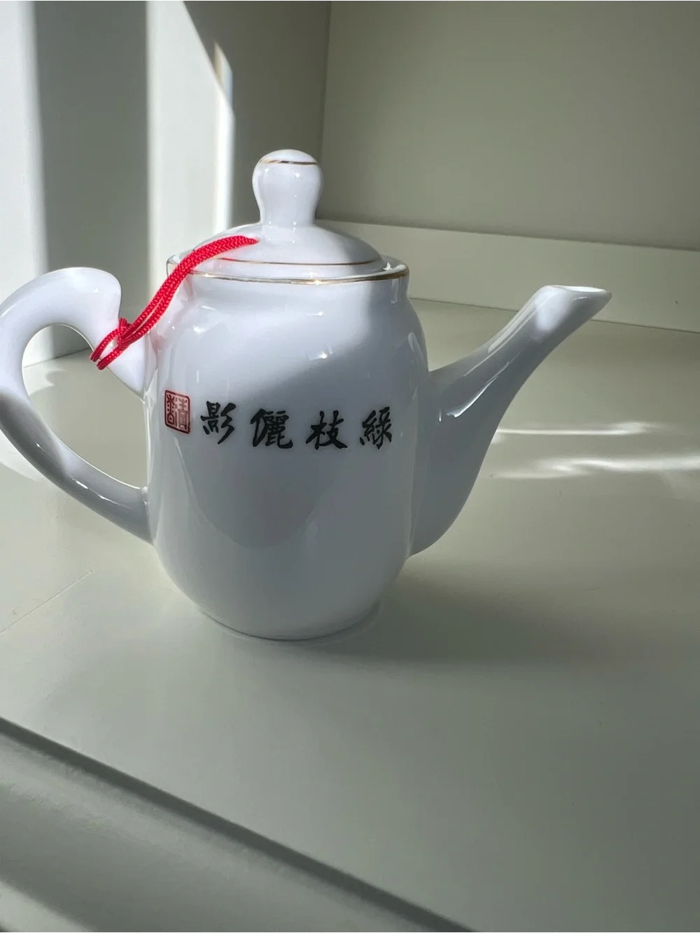 White Porcelain Teapot with Bird & Floral Motif